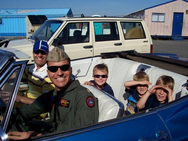 Vincent taking his brother, nephews, and son out for a cruise in the Impala.