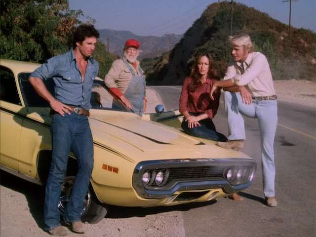 In this episode of the Dukes the General performed THE big jump of his career! This clip was recycled for multiple episodes as the show ran on….but if you had to identify which ONE single jump is
associated with the General, it’s this one for sure. Fun fact: The Charger in this jump was actually a 1968, dressed up to look like a ’69! IMAGE: Warner Bros.